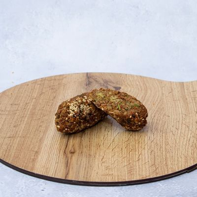Falafel kofta patty on charcoal