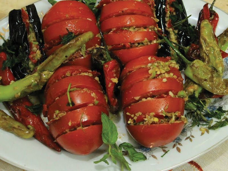 Pickled tomatoes with arugula