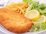 Chicken Pane With Nuts Rice And Pommes Frites Fries