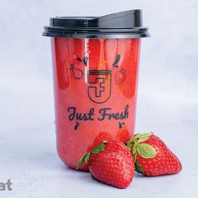 Fresh strawberry seeds and juice