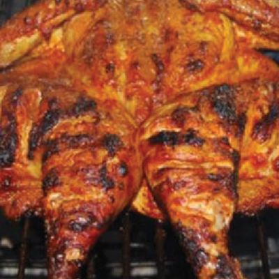 Grilled chicken on charcoal