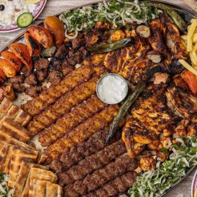 Half a chicken , half a mixed lamb , rice , potatoes