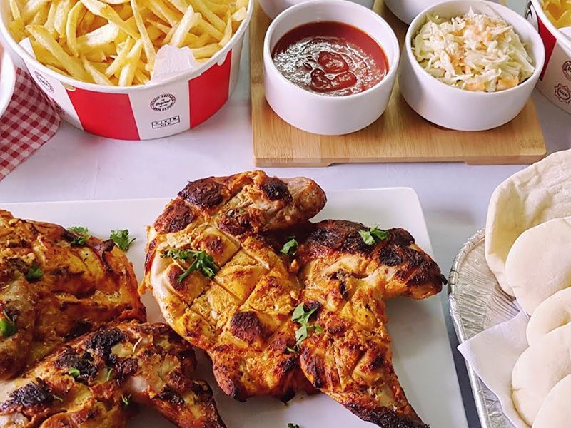 grilled chicken on charcoal meal