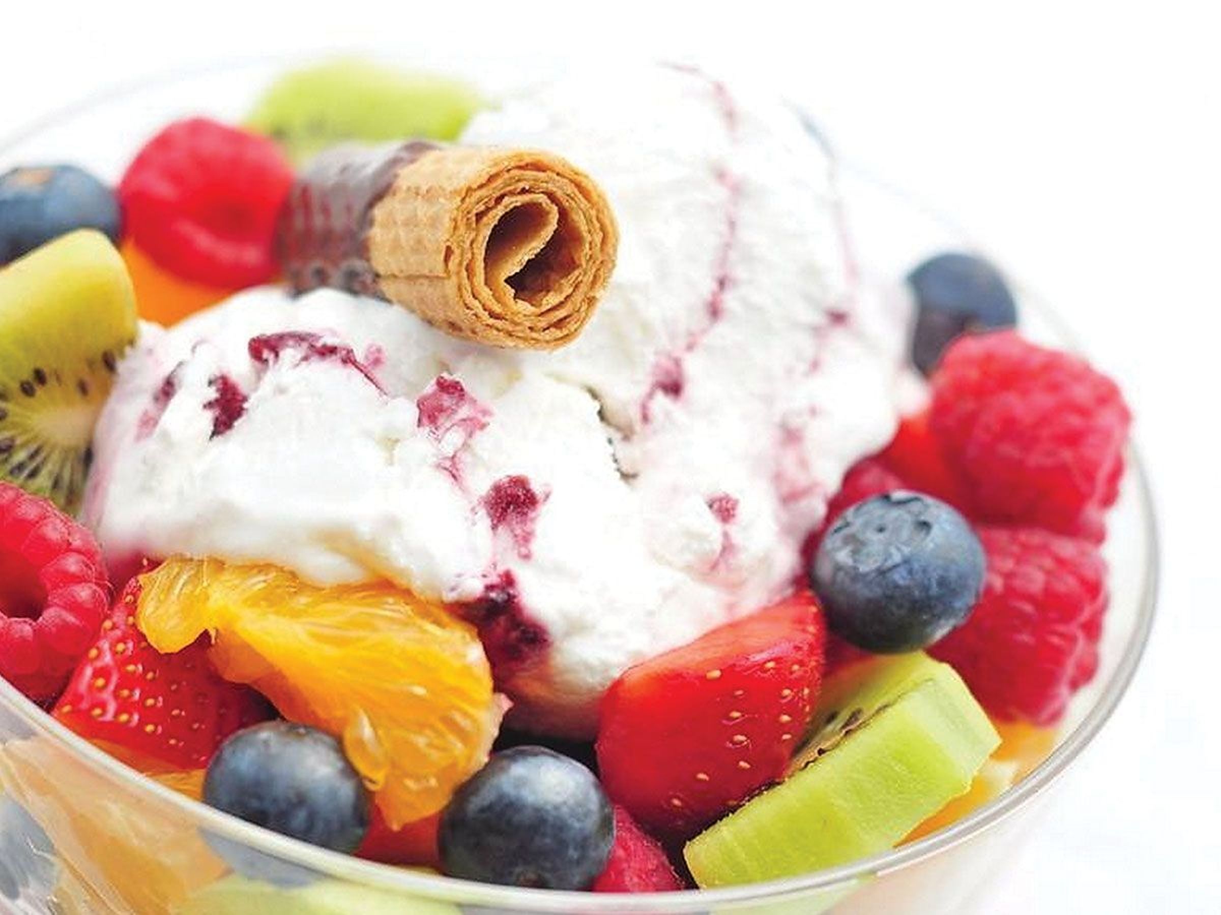 Large fruit salad with ice cream