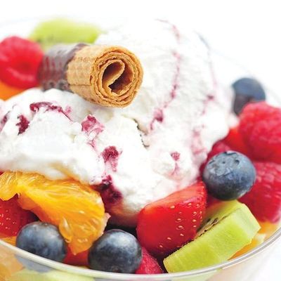 Large fruit salad with ice cream