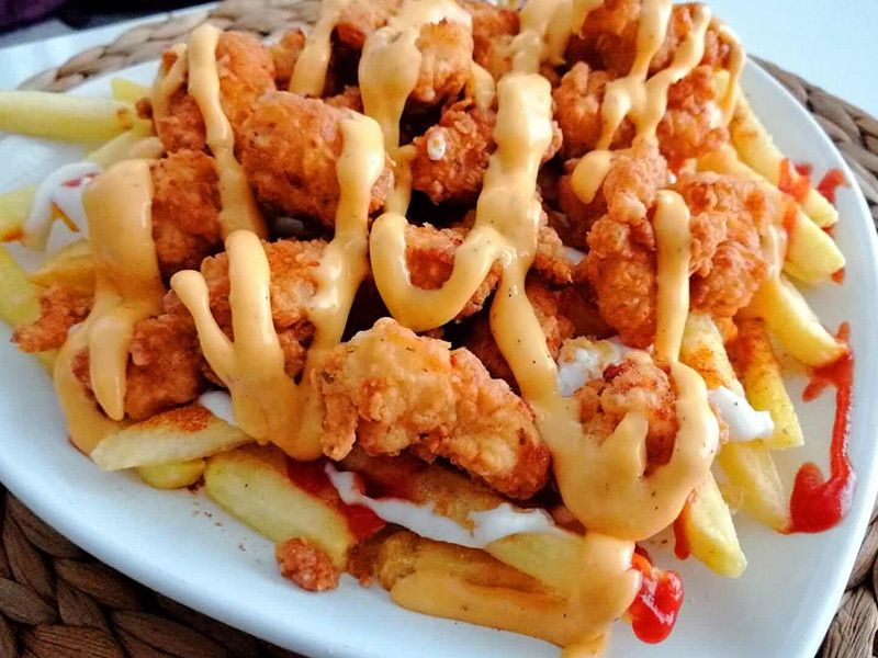 French Fries With Chicken and Mozzarella Cheese