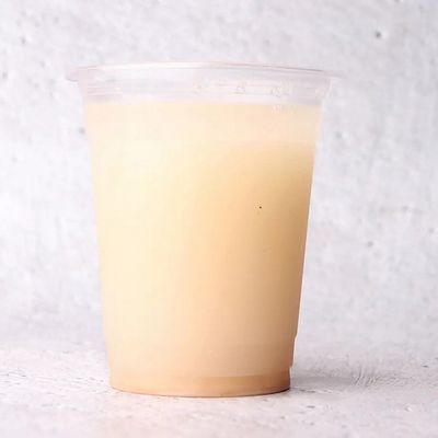 Large iced sugarcane juice cup