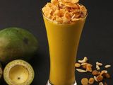 Sugarcane With Mango And Nuts Juice