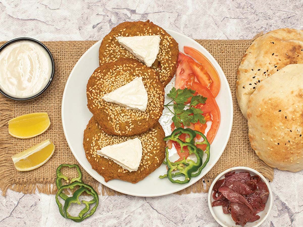 falafel piece stuffed with triangle cheese