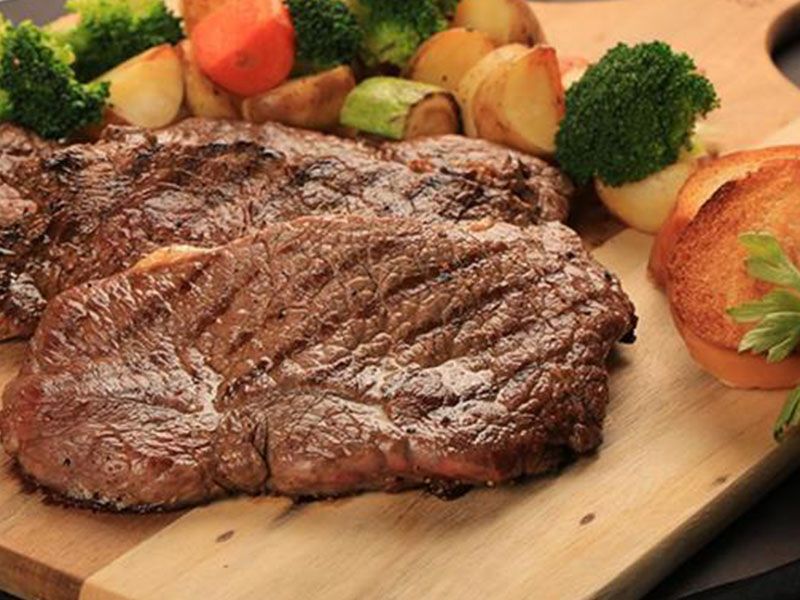 2 pieces of steak with vegetables Meal
