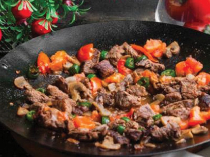 Veal Cubes With Rice And Salad Meal