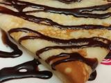 Chocolate crepe with apple and banana