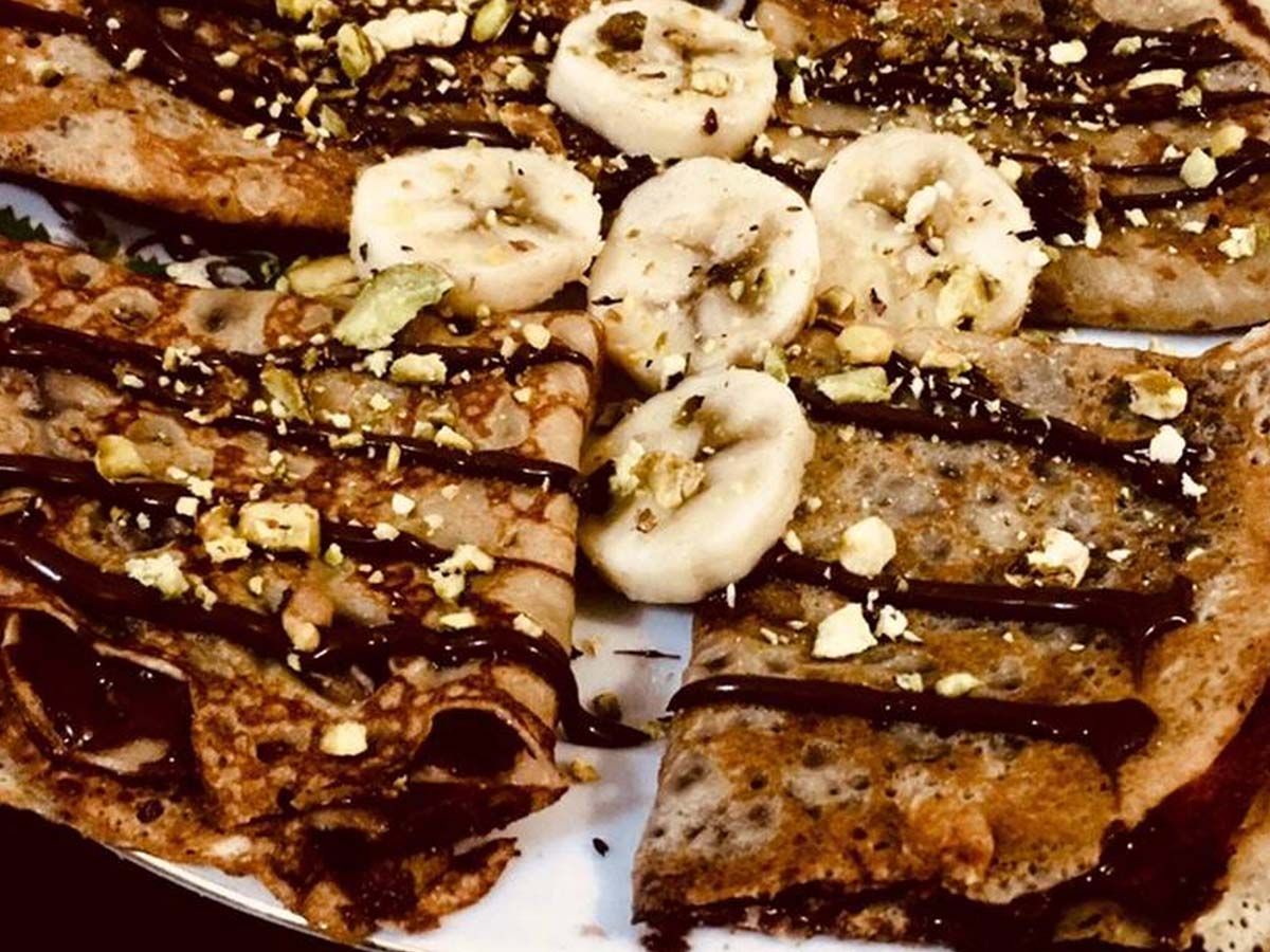 Crepe with Nutella, banana, and nuts
