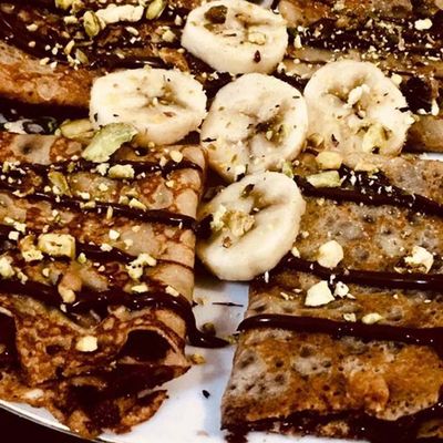 Crepe with Nutella, banana, and nuts