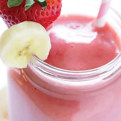 Banana with milk and strawberries cocktail