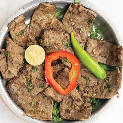 Liver slices on charcoal