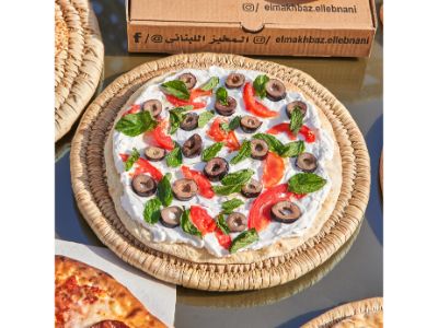 Labneh with smoked turkey and vegetables manoushe