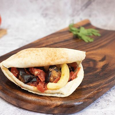 Shami Mesakaa With Sausage Sandwich