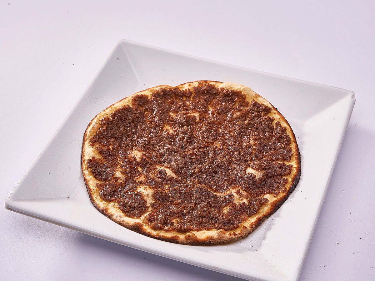 Quarter kilo of black meat on dough