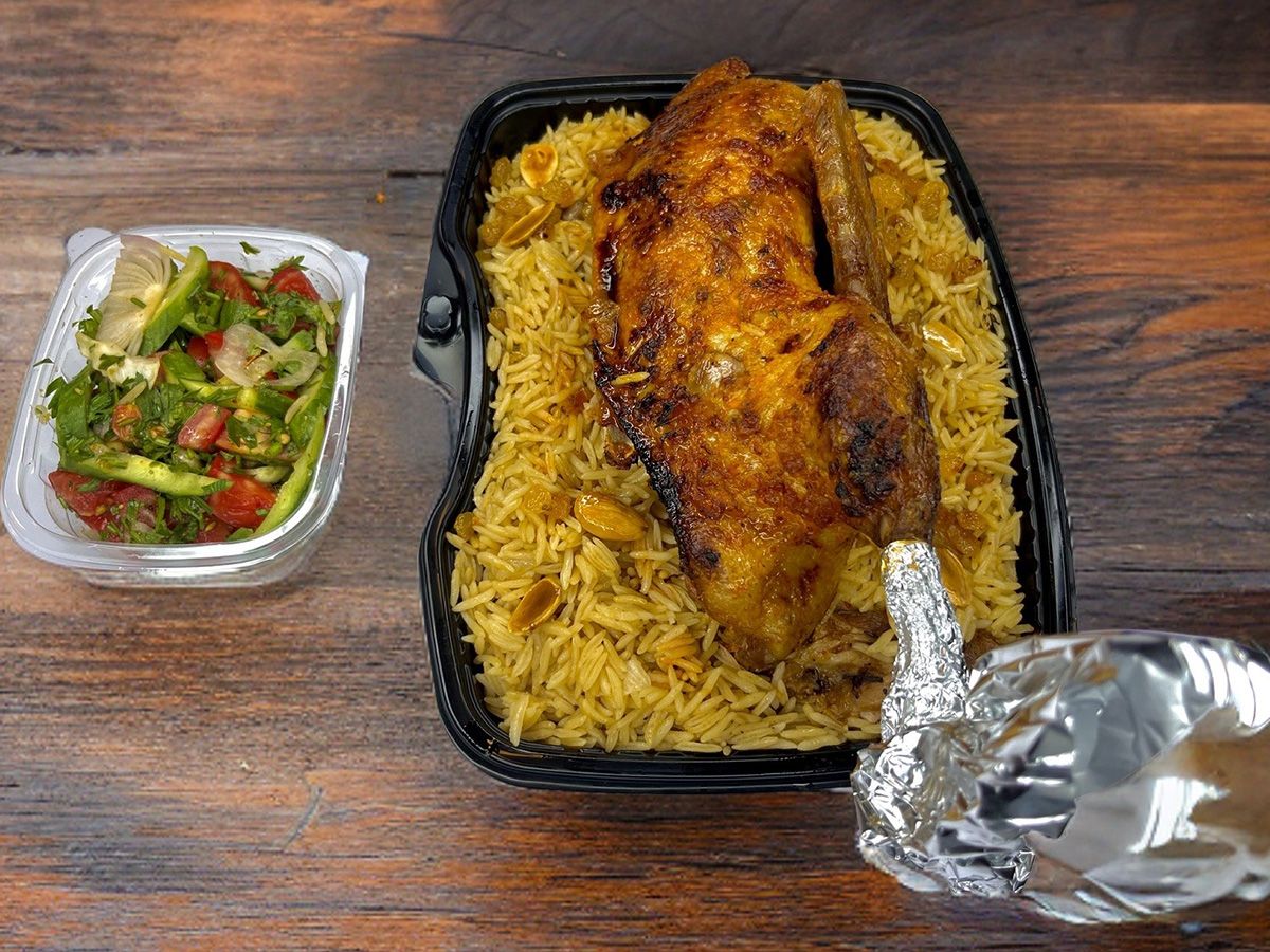 Half duck with basmati rice with nuts and salad box meal