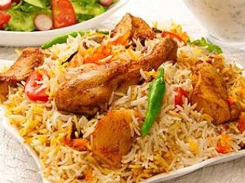 Half grilled chicken with biryani rice