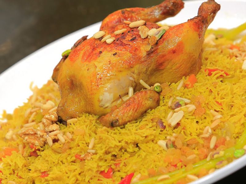 Half chicken mandi with kabsa rice