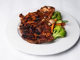 Half a chicken on charcoal