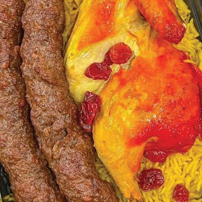 Half grilled or mandi chicken with quarter kofta, rice, and salads