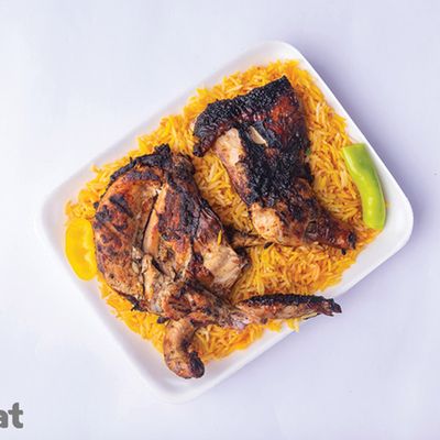 نصف دجاجة مشوية