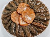 Vine leaves with pomegranate molasses