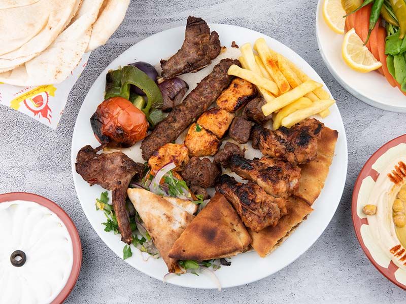 1 kilo mix grill served with hommos , veg and fries - Picture of Shams Al  Sham Restaurant, Ajman - Tripadvisor