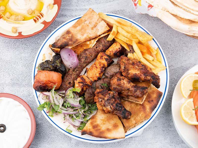 1 kilo mix grill served with hommos , veg and fries - Picture of Shams Al  Sham Restaurant, Ajman - Tripadvisor