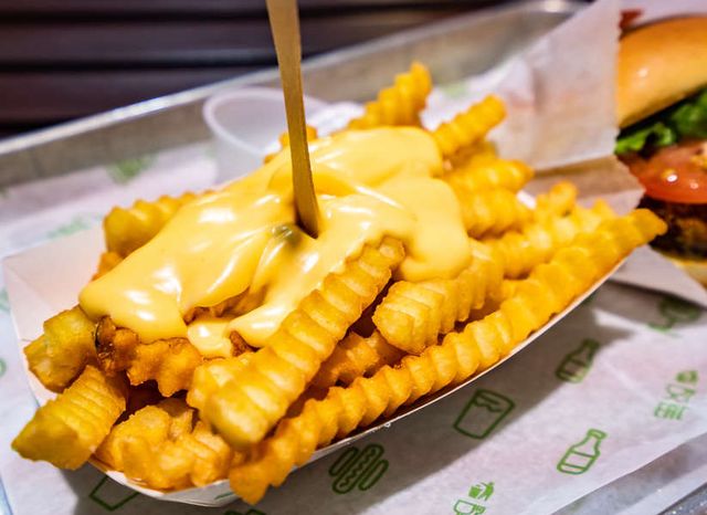 French Fries With Cheddar Cheese Sauce Sandwich