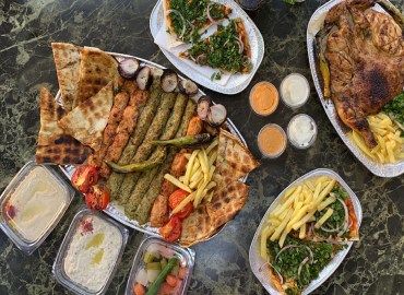 1 kilo mix grill served with hommos , veg and fries - Picture of Shams Al  Sham Restaurant, Ajman - Tripadvisor