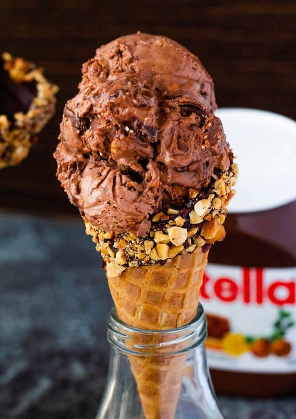 Cono Ice Cream With Hot Nutella Chocolate And Nuts