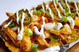 French Fries With Cheese And Jalapeno Sauce