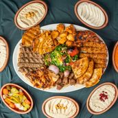 1 kilo mix grill served with hommos , veg and fries - Picture of Shams Al  Sham Restaurant, Ajman - Tripadvisor