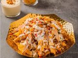Lebanese fatteh with chicken and pine nut