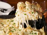 White Sauce Seafood With Mozzarella And Cheddar Shell