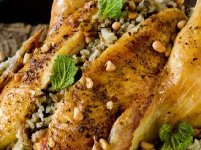 Chicken Stuffed With Rice And Meat