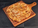 Qeshta and honey Feteera