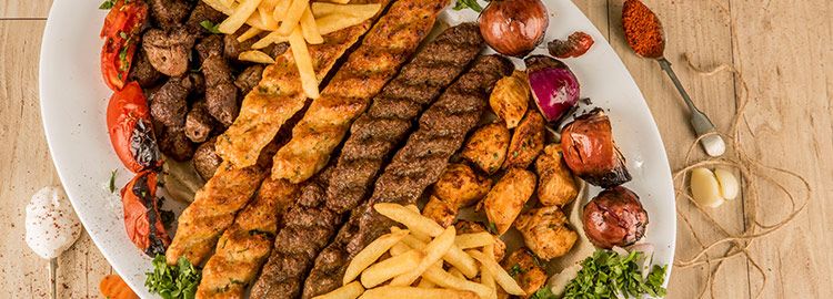 1 kilo mix grill served with hommos , veg and fries - Picture of Shams Al  Sham Restaurant, Ajman - Tripadvisor