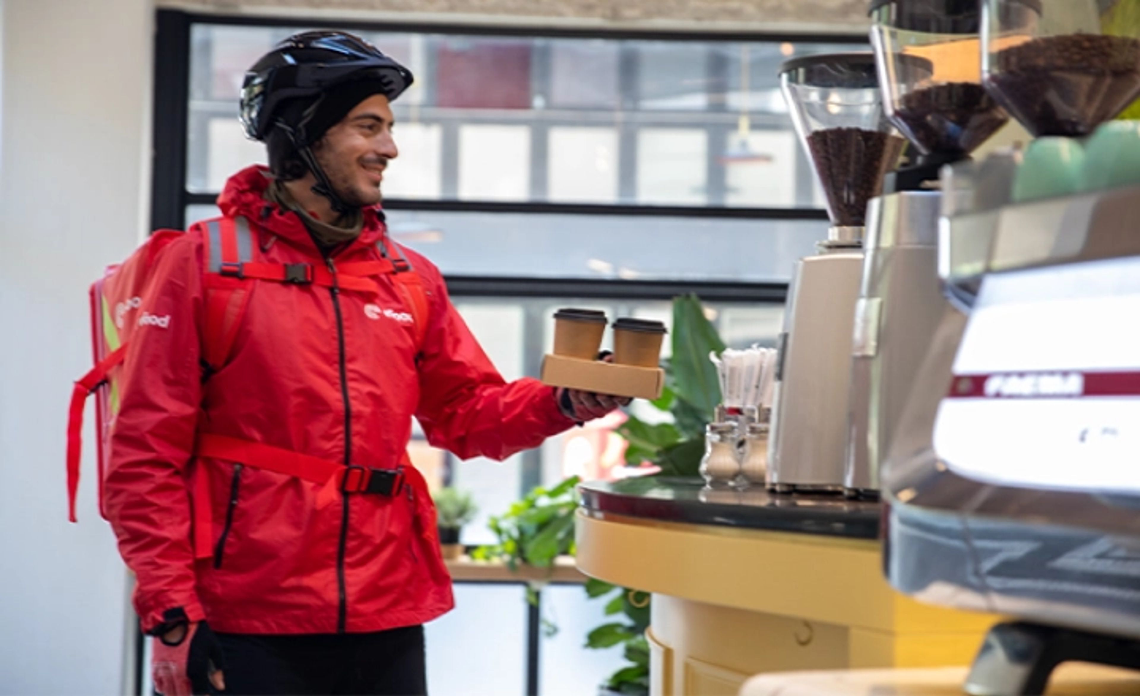 person packing coffee